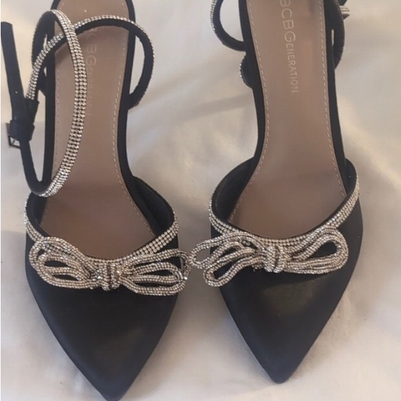 BCBGeneration Black Heels with Silver Bow Accents - Picture 1 of 5